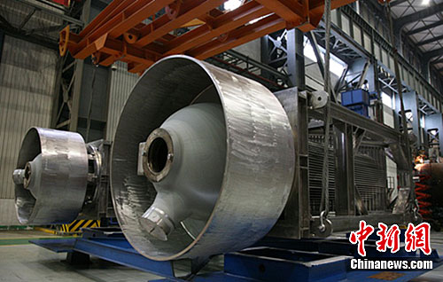 China's first AP1000 reactor makes its debut in Guangzhou, capital of Guangdong Province on March 1, 2012. Now the country's three largest nuclear power equipment manufacturers are all capable of making advanced AP1000 reactor units on their own.