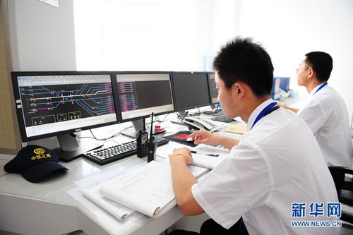 Technicians test communication equipment for subway line 6 (Phase 1) which will open this September in Beijing, May 9, 2012.[Photo/Xinhua]