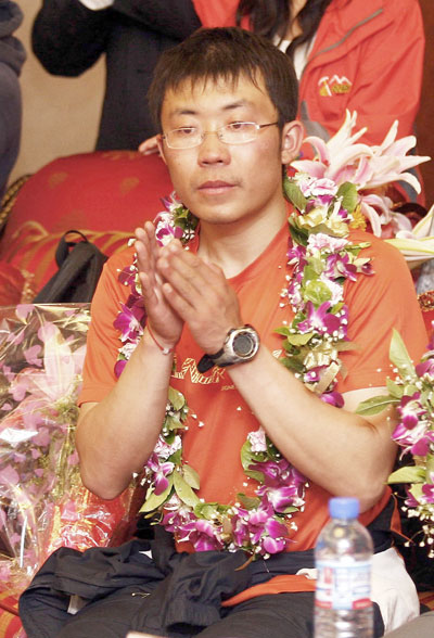 Yan Dongdong, 28, in Beijing after carrying the Olympic torch with other climbers to Qomolangma in May 2008.