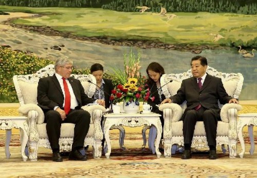 Jia Qinglin (R), chairman of the National Committee of the Chinese People's Political Consultative Conference (CPPCC), meets with Bruno Zuppiger, president of the Swiss Federal Assembly's Switzerland-China Parliamentary Group, at the Great Hall of the Peo