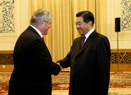 Jia Qinglin (R), chairman of the National Committee of the Chinese People's Political Consultative Conference (CPPCC), meets with Bruno Zuppiger, president of the Swiss Federal Assembly's Switzerland-China Parliamentary Group, at the Great Hall of the Peo
