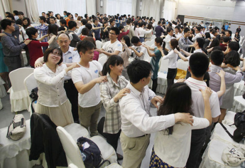 Experts say the transition for online dating to real-life interaction is very important, so dating parties like this at the Chaoyang Museum of Urban Planning are often the next step forward. Xinhua