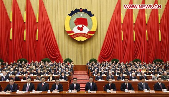 Hu Jintao, Xi Jinping, Wu Bangguo, Wen Jiabao, Jia Qinglin, Li Keqiang, Zhang Dejiang, Liu Yunshan, Wang Qishan and Zhang Gaoli sit on the platform during the opening meeting of the first session of the 12th National Committee of the Chinese People's Political Consultative Conference (CPPCC) at the Great Hall of the People in Beijing, capital of China, March 3, 2013. The first session of the 12th CPPCC National Committee opened in Beijing on March 3. (Xinhua/Ju Peng)