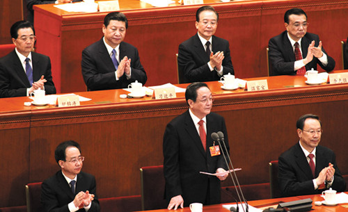 Yu Zhengsheng, chairman of the 12th Chinese Peoples Political Consultative Conference National Committee, addresses the closing meeting of the first session of the conference on Tuesday in Beijing. [Zhu Xingxin / China Daily]