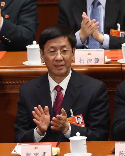 Cao Jianming attends the fifth plenary meeting of the first session of the 12th National People's Congress (NPC) in Beijing, capital of China, March 15, 2013. Cao was re-elected procurator-general of the Supreme People's Procuratorate of China at the meeting here on Friday. (Xinhua/Jin Liwang)