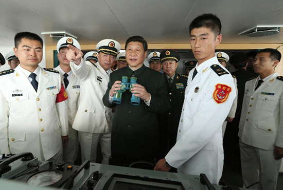 In this file photo taken on Dec. 8, 2012, Xi Jinping (2nd R, front) inspects at the Guangzhou military theater of operations of the People's Liberation Army (PLA), south China's Guangdong Province. (Xinhua/Wang Jianmin)