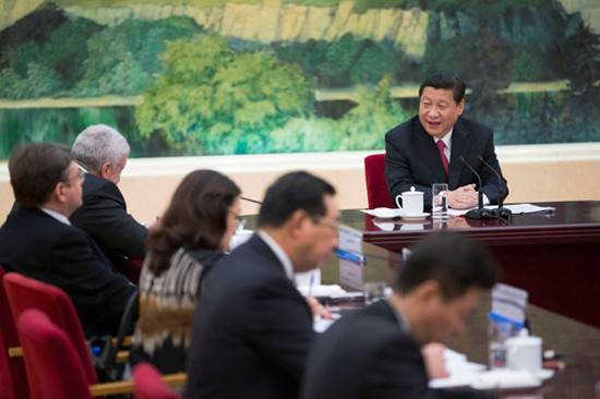 President Xi Jinping tells reporters from BRICS countries on Tuesday in Beijing that he expects the BRICS leaders summit will send a positive message to the global community. Lan Hongguang / Xinhua