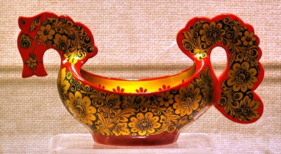 This wooden alms bowl, covered with gilding, was a present from then Soviet foreign minister Eduard Shevardnadze to his Chinese counterpart Qian Qichen in 1990. [Photo by Jing Wei / for China Daily]