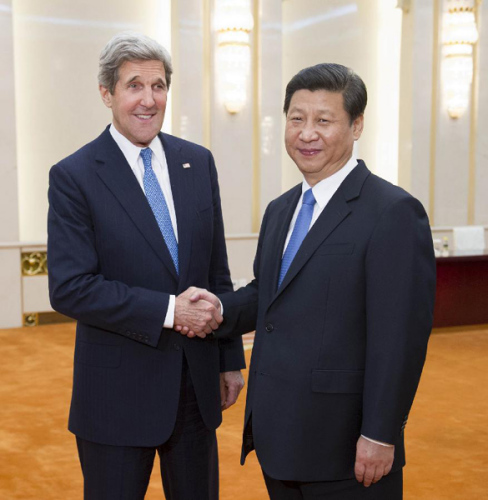 Chinese President Xi Jinping (R) shakes hands with U.S. Secretary of State John Kerry in Beijing, capital of China, April 13, 2013. (Xinhua/Huang Jingwen)