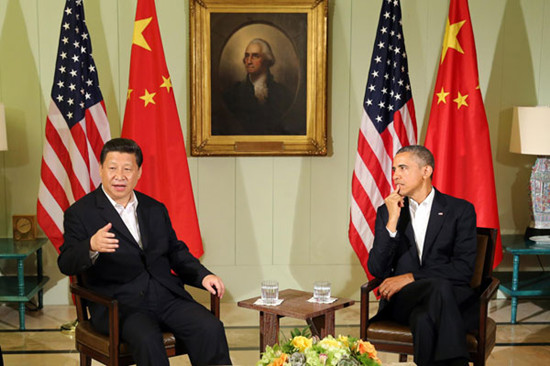 President Xi Jinping and US President Barack Obama meet the media after their talk at Sunnylands in Rancho Mirage, California, on Friday. Lan Hongguang / Xinhua