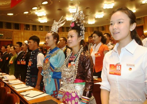 Representatives sing the national anthem during the opening ceremony of the 17th national congress of the Communist Youth League of China (CYLC) in Beijing, capital of China, June 17, 2013. Founded in 1922, the CYLC is a mass youth organization under the leadership of the Communist Party of China. (Xinhua/Wang Shen) Representatives sing the national anthem during the opening ceremony of the 17th national congress of the Communist Youth League of China (CYLC) in Beijing, capital of China, June 17, 2013. Founded in 1922, the CYLC is a mass youth organization under the leadership of the Communist Party of China. (Xinhua/Wang Shen)