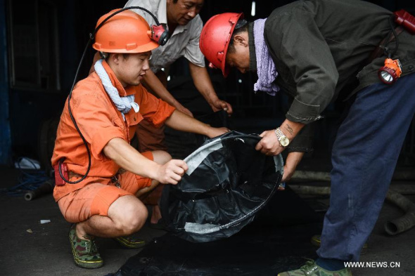Rescuers prepare to enter the accident site in the Dongfang Coal Mine in Xiejiaji District of Huainan city, east China's Anhui province, Aug 22, 2014. (Xinhua/Zhang Duan) Rescuers prepare to enter the accident site in the Dongfang Coal Mine in Xiejiaji District of Huainan city, east China's Anhui province, Aug 22, 2014. (Xinhua/Zhang Duan)
