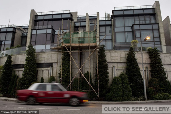 Photo taken on August 7, 2014 shows the exterior appearance of luxury Twelve Peaks property in the Victoria Peak district of Hong Kong. [Photo/ CFP]