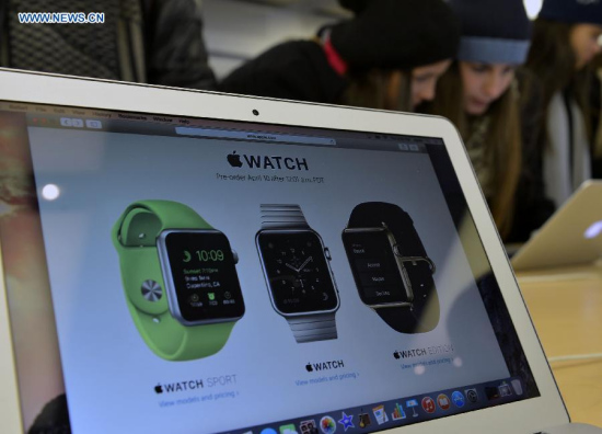 Customers test Apple products at Apple flag store in Manhattan, New York, the United States, on April 9, 2015. Apple Watch, the first Apple product to be worn, will be available for purchase online on April 24, and customers can pre-order from April 10. (Xinhua/Wang Lei) Customers test Apple products at Apple flag store in Manhattan, New York, the United States, on April 9, 2015. Apple Watch, the first Apple product to be worn, will be available for purchase online on April 24, and customers can pre-order from April 10. (Xinhua/Wang Lei)