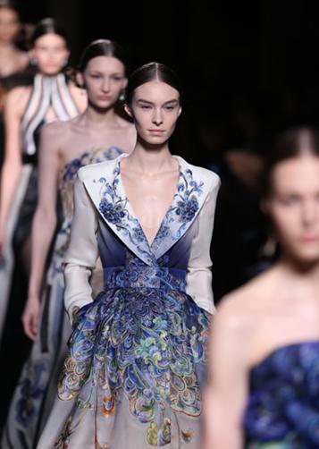 Models present creations by Laurence Xu at the Paris Haute Couture Fashion Week. Photo provided to China Daily Models present creations by Laurence Xu at the Paris Haute Couture Fashion Week. Photo provided to China Daily