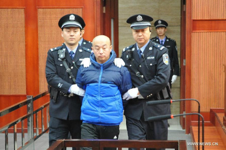 Alleged serial killer Zhao Zhihong is escorted to stand trial for murder, rape, robbery and larceny at the Hohhot Intermediate People's Court in Hohhot, capital of north China's Inner Mongolia Autonomous Region, Feb. 9, 2015.(Xinhua) Alleged serial killer Zhao Zhihong is escorted to stand trial for murder, rape, robbery and larceny at the Hohhot Intermediate People's Court in Hohhot, capital of north China's Inner Mongolia Autonomous Region, Feb. 9, 2015.(Xinhua)