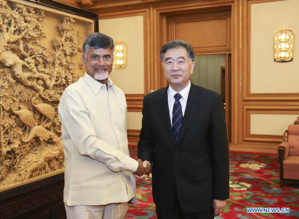 Chinese Vice Premier Wang Yang (R) meets with Nara Chandrababu Naidu, chief minister of Andhra Pradesh and President of Telugu Desam Party (TDP), in Beijing, capital of China, April 13, 2015. (Xinhua/Ding Lin) Chinese Vice Premier Wang Yang (R) meets with Nara Chandrababu Naidu, chief minister of Andhra Pradesh and President of Telugu Desam Party (TDP), in Beijing, capital of China, April 13, 2015. (Xinhua/Ding Lin)