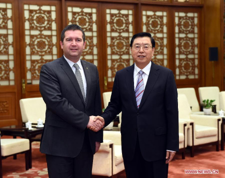 Zhang Dejiang (R), chairman of the Standing Committee of China's National People's Congress (NPC) and a member of the Standing Committee of the Political Bureau of the Communist Party of China (CPC) Central Committee, meets with Jan Hamacek, president of the chamber of deputies of the Czech Republic and also deputy president of the Czech Social Democratic Party, at the Great Hall of the People in Beijing, capital of China, April 20, 2015. (Xinhua/Rao Aimin) Zhang Dejiang (R), chairman of the Standing Committee of China's National People's Congress (NPC) and a member of the Standing Committee of the Political Bureau of the Communist Party of China (CPC) Central Committee, meets with Jan Hamacek, president of the chamber of deputies of the Czech Republic and also deputy president of the Czech Social Democratic Party, at the Great Hall of the People in Beijing, capital of China, April 20, 2015. (Xinhua/Rao Aimin)