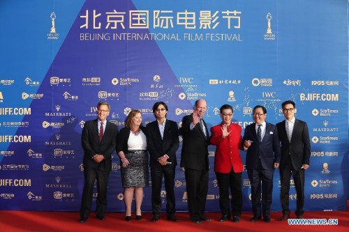 Chinese actor Zhang Jinlai (stage named Liuxiao Lingtong, 3rd R), Ma Dehua (2nd R) and other crew members of the movie Journey To the West walk the red carpet during the opening ceremony of the fifth Beijing International Film Festival (BJIFF) in Beijing, capital of China, April 16, 2015. The BJIFF kicks off Thursday and will last until April 23. (Photo: Xinhua/Xing Guangli) Chinese actor Zhang Jinlai (stage named Liuxiao Lingtong, 3rd R), Ma Dehua (2nd R) and other crew members of the movie Journey To the West walk the red carpet during the opening ceremony of the fifth Beijing International Film Festival (BJIFF) in Beijing, capital of China, April 16, 2015. The BJIFF kicks off Thursday and will last until April 23. (Photo: Xinhua/Xing Guangli)