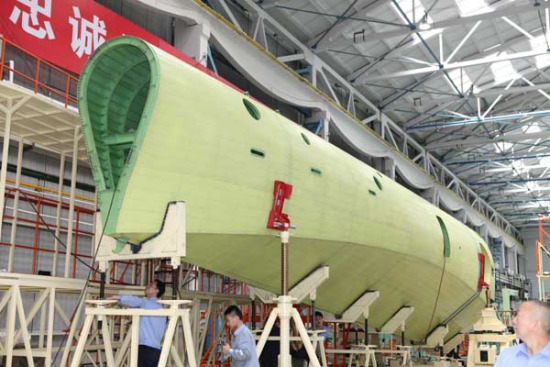 A section of fuselage for China's large amphibious aircraft AG-600 completed and ready for delivery in Hanzhong, Shaanxi province, on Sunday. (Photo/China Daily) A section of fuselage for China's large amphibious aircraft AG-600 completed and ready for delivery in Hanzhong, Shaanxi province, on Sunday. (Photo/China Daily)