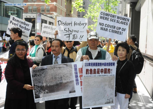 Protesters are seen in a demonstration against Japanese Prime Minister Shinzo Abe's continued efforts to distort historic facts in San Frnacisco, California, the United States, on April 28, 2015. Hundreds of Chinese and Korean Americans took to the street on Tuesday in San Francisco, demanding an apology from visiting Japanese Prime Minister Shinzo Abe. (Xinhua/Xu Yong) Protesters are seen in a demonstration against Japanese Prime Minister Shinzo Abe's continued efforts to distort historic facts in San Frnacisco, California, the United States, on April 28, 2015. Hundreds of Chinese and Korean Americans took to the street on Tuesday in San Francisco, demanding an apology from visiting Japanese Prime Minister Shinzo Abe. (Xinhua/Xu Yong)