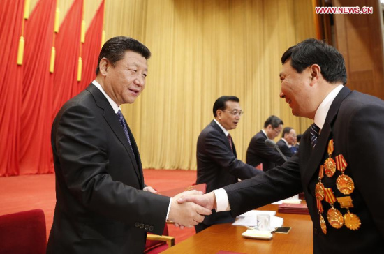 Chinese President Xi Jinping, Premier Li Keqiang and other senior leaders issue certificates of honor to national model workers during an award ceremony, which was held ahead of Worker's Day on May 1, in Beijing, capital of China, April 28, 2015. (Xinhua/Ju Peng) Chinese President Xi Jinping, Premier Li Keqiang and other senior leaders issue certificates of honor to national model workers during an award ceremony, which was held ahead of Worker's Day on May 1, in Beijing, capital of China, April 28, 2015. (Xinhua/Ju Peng)