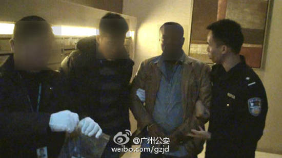 A suspected member of the 'Freedom Fighters', second from right, is arrested. (Photo/Weibo) A suspected member of the 'Freedom Fighters', second from right, is arrested. (Photo/Weibo)