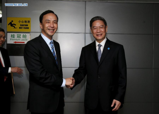Zhang Zhijun (R), head of the Taiwan Work Office of the Communist Party of China (CPC) Central Committee, meets Eric Chu, Chairman of Taiwan's Kuomintang (KMT) Party, at the airport in east China's Shanghai, May 2, 2015. Chu arrived in Shanghai on Saturday for a cross-Strait forum. (Xinhua/Liu Ying) Zhang Zhijun (R), head of the Taiwan Work Office of the Communist Party of China (CPC) Central Committee, meets Eric Chu, Chairman of Taiwan's Kuomintang (KMT) Party, at the airport in east China's Shanghai, May 2, 2015. Chu arrived in Shanghai on Saturday for a cross-Strait forum. (Xinhua/Liu Ying)