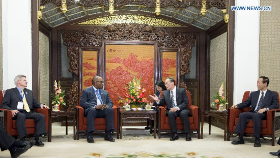 Wang Qishan (2nd R), a member of the Standing Committee of the Political Bureau of the Communist Party of China (CPC) Central Committee and secretary of the CPC Central Commission for Discipline Inspection (CCDI), meets with a U.S. delegation composed of members from the Democratic Party and the Republican Party, in Beijing, capital of China, May 7, 2015. (Xinhua/Wang Ye) Wang Qishan (2nd R), a member of the Standing Committee of the Political Bureau of the Communist Party of China (CPC) Central Committee and secretary of the CPC Central Commission for Discipline Inspection (CCDI), meets with a U.S. delegation composed of members from the Democratic Party and the Republican Party, in Beijing, capital of China, May 7, 2015. (Xinhua/Wang Ye)