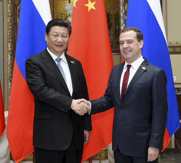 Chinese President Xi Jinping (L) meets with Russian Prime Minister Dmitry Medvedev in Moscow, Russia, May 9, 2015. (Xinhua/Rao Aimin) Chinese President Xi Jinping (L) meets with Russian Prime Minister Dmitry Medvedev in Moscow, Russia, May 9, 2015. (Xinhua/Rao Aimin)