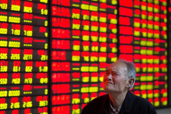 An investor follows information at a stock trading hall in Nanjing City, capital of east China's Jiangsu Province, May 11, 2015. Chinese shares ended higher on Monday, with the benchmark Shanghai Composite Index up 3.04 percent, or 127.67 points, to finish at 4,333.58 points. (Xinhua/Su Yang) An investor follows information at a stock trading hall in Nanjing City, capital of east China's Jiangsu Province, May 11, 2015. Chinese shares ended higher on Monday, with the benchmark Shanghai Composite Index up 3.04 percent, or 127.67 points, to finish at 4,333.58 points. (Xinhua/Su Yang)