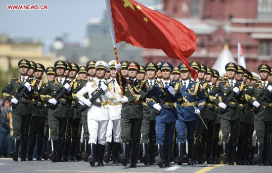 The guard of honor of the three services of the Chinese People's Liberation Army (PLA) take part in the military parade marking the 70th anniversary of the victory in the Great Patriotic War, in Moscow, Russia, May 9, 2015. (Xinhua/Jia Yuchen) The guard of honor of the three services of the Chinese People's Liberation Army (PLA) take part in the military parade marking the 70th anniversary of the victory in the Great Patriotic War, in Moscow, Russia, May 9, 2015. (Xinhua/Jia Yuchen)