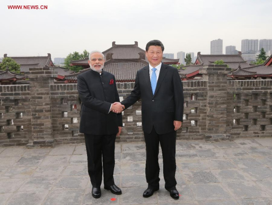 Chinese President Xi Jinping (R) accompanies Indian Prime Minister Narendra Modi to the Da Ci'en Temple after their meeting in Xi'an, capital of northwest China's Shaanxi Province, May 14, 2015. (Xinhua/Lan Hongguang) Chinese President Xi Jinping (R) accompanies Indian Prime Minister Narendra Modi to the Da Ci'en Temple after their meeting in Xi'an, capital of northwest China's Shaanxi Province, May 14, 2015. (Xinhua/Lan Hongguang)