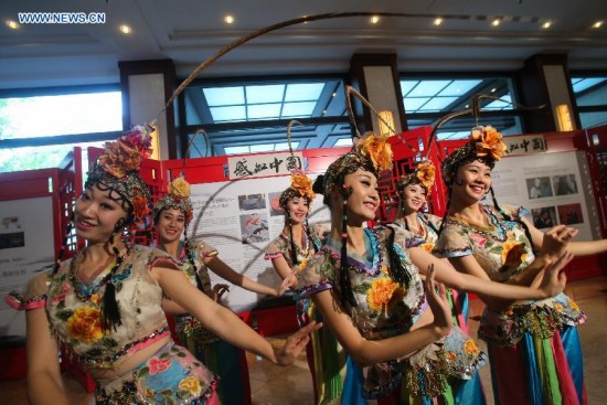 Chinese dancers wearing traditional costumes perform during the opening ceremony of Experience China culture event in Berlin, Germany, on May. 17, 2015. (Xinhua/Zhang Fan) Chinese dancers wearing traditional costumes perform during the opening ceremony of Experience China culture event in Berlin, Germany, on May. 17, 2015. (Xinhua/Zhang Fan)