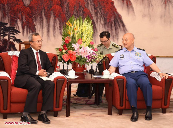 Xu Qiliang (R), vice chairman of China's Central Military Commission, meets with visiting Malaysian defense ministry secretary general Abdul Rahim in Beijing, capital of China, May 18, 2015. (Xinhua/Gao Jie) Xu Qiliang (R), vice chairman of China's Central Military Commission, meets with visiting Malaysian defense ministry secretary general Abdul Rahim in Beijing, capital of China, May 18, 2015. (Xinhua/Gao Jie)