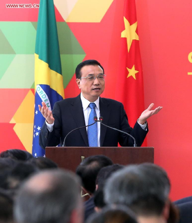 Visiting Chinese Premier Li Keqiang attends a joint press conference with Brazilian President Dilma Rousseff in Brasilia, capital of Brazil, May 19, 2015. (Xinhua/Pang Xinglei) 