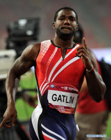 Justin Gatlin of the United States celebrates after winning the men's 100 meters at the IAAF World Challenge Beijing, China, May 21, 2014. Justin Gatlin finished the match in 9.87 seconds and claimed the title of the event. (Xinhua/Gong Lei) Justin Gatlin of the United States celebrates after winning the men's 100 meters at the IAAF World Challenge Beijing, China, May 21, 2014. Justin Gatlin finished the match in 9.87 seconds and claimed the title of the event. (Xinhua/Gong Lei)