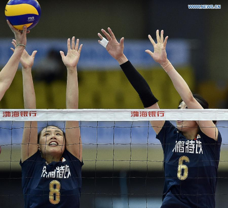 Zeng Chunlei (L) and Yang Junjiang of China block the ball during the match against Vietnam at the 18th Asian Senior Women's Volleyball Championships in Tianjin, north China, on May 24, 2015. China won 3-0. (Xinhua/Yue Yuewei) Zeng Chunlei (L) and Yang Junjiang of China block the ball during the match against Vietnam at the 18th Asian Senior Women's Volleyball Championships in Tianjin, north China, on May 24, 2015. China won 3-0. (Xinhua/Yue Yuewei)