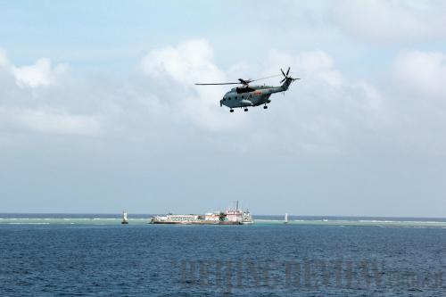 A Chinese helicopter patrols the South China Sea on January 25, 2014 (XINHUA) A Chinese helicopter patrols the South China Sea on January 25, 2014 (XINHUA)