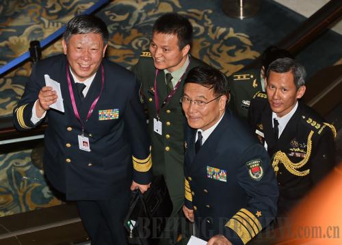 Sun Jianguo (front right), Deputy Chief of the General Staff of the People's Liberation Army, arrives for a meeting ahead of the 14th Asia Security Summit, or the Shangri-La Dialogue, in Singapore on May 29 (CFP) Sun Jianguo (front right), Deputy Chief of the General Staff of the People's Liberation Army, arrives for a meeting ahead of the 14th Asia Security Summit, or the Shangri-La Dialogue, in Singapore on May 29 (CFP)