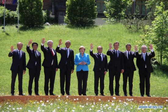 Participants of the G7 summit (L-R) President of the European Council Donald Tusk, Japanese Prime Minister Shinzo Abe, Canadian Prime Minister Stephen Harper, U.S. President Barack Obama, German Chancellor Angela Merkel, French President Francois Hollande, British Prime Minister David Cameron, Italian Prime Minister Matteo Renzi and European Commission President Jean-Claude Junker have a group photo taken at the Elmau Castle near Garmisch-Partenkirchen, southern Germany, on June 7, 2015.(Xinhua/Zhu Sheng) Participants of the G7 summit (L-R) President of the European Council Donald Tusk, Japanese Prime Minister Shinzo Abe, Canadian Prime Minister Stephen Harper, U.S. President Barack Obama, German Chancellor Angela Merkel, French President Francois Hollande, British Prime Minister David Cameron, Italian Prime Minister Matteo Renzi and European Commission President Jean-Claude Junker have a group photo taken at the Elmau Castle near Garmisch-Partenkirchen, southern Germany, on June 7, 2015.(Xinhua/Zhu Sheng)