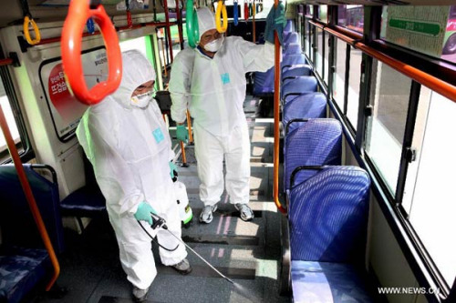 Health workers disinfect a bus in Seoul, South Korea, on June 15, 2015. (Photo/Xinhua) Health workers disinfect a bus in Seoul, South Korea, on June 15, 2015. (Photo/Xinhua)