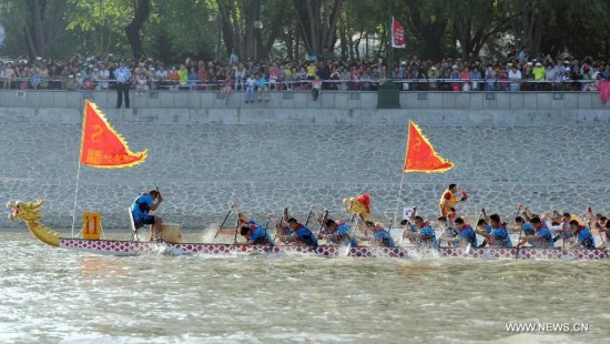 Participants compete in a dragon boat race to mark the Dragon Boat Festival, in Harbin, capital of northeast China's Heilongjiang Province, June 20, 2015. (Photo: Xinhua/Liu Yang) Participants compete in a dragon boat race to mark the Dragon Boat Festival, in Harbin, capital of northeast China's Heilongjiang Province, June 20, 2015. (Photo: Xinhua/Liu Yang)