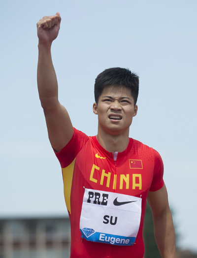 Chinese sprinter Su Bingtian celebrates after clocking 9.99s to finish third in the men's 100m final at the Eugene Grand Prix in Oregon May 30, 2015. (Photo/Xinhua) Chinese sprinter Su Bingtian celebrates after clocking 9.99s to finish third in the men's 100m final at the Eugene Grand Prix in Oregon May 30, 2015. (Photo/Xinhua)
