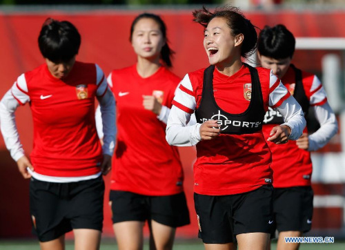 China's Wu Haiyan (Front) takes part in a training session in Ottawa, Canada, June 24, 2015. China will play the United States in their quarterfinal of 2015 FIFA Women's World Cup on June 26. (Xinhua/Wang Lili) China's Wu Haiyan (Front) takes part in a training session in Ottawa, Canada, June 24, 2015. China will play the United States in their quarterfinal of 2015 FIFA Women's World Cup on June 26. (Xinhua/Wang Lili)