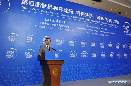 Chinese Foreign Minister Wang Yi speaks at the luncheon of the fourth World Peace Forum in Beijing, capital of China, June 27, 2015. (Xinhua/Ding Haitao) Chinese Foreign Minister Wang Yi speaks at the luncheon of the fourth World Peace Forum in Beijing, capital of China, June 27, 2015. (Xinhua/Ding Haitao)