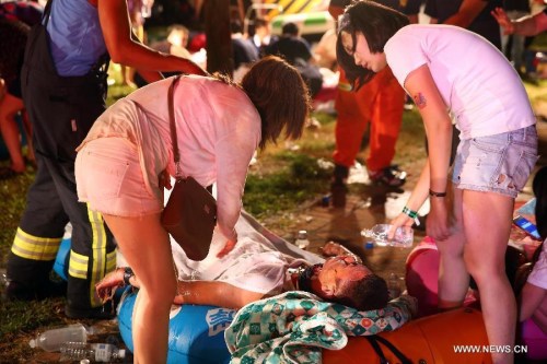People injured in a fire are attended at a park in New Taipei, southeast China's Taiwan, June 27, 2015. (Photo: Xinhua) People injured in a fire are attended at a park in New Taipei, southeast China's Taiwan, June 27, 2015. (Photo: Xinhua)
