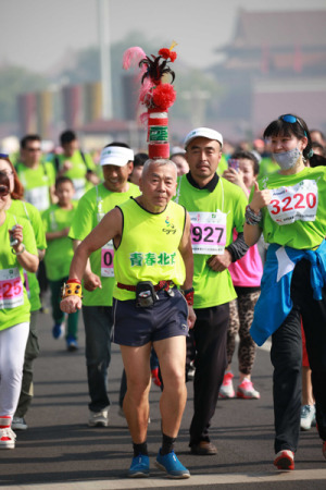 A senior citizen participates in an international running festival in April. The life expectancy of Beijing's permanent residents reached almost 82 years last year. (Chen Jiannan/for China Daily) A senior citizen participates in an international running festival in April. The life expectancy of Beijing's permanent residents reached almost 82 years last year. (Chen Jiannan/for China Daily)