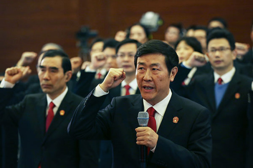 Shen Deyong, executive vice-president of the Supreme People's Court, takes the lead in making an oath to the Constitution in Beijing in December. (Wang Jing/China Daily) Shen Deyong, executive vice-president of the Supreme People's Court, takes the lead in making an oath to the Constitution in Beijing in December. (Wang Jing/China Daily)