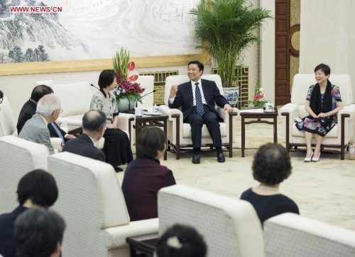 Chinese Vice President Li Yuanchao (back, 2nd R) meets with a group of Japanese orphans who were raised up by Chinese families after the Chinese People's War in Resistance Against Japanese Aggression in Beijing, capital of China, July 15, 2015. (Xinhua/Wang Ye) Chinese Vice President Li Yuanchao (back, 2nd R) meets with a group of Japanese orphans who were raised up by Chinese families after the Chinese People's War in Resistance Against Japanese Aggression in Beijing, capital of China, July 15, 2015. (Xinhua/Wang Ye)